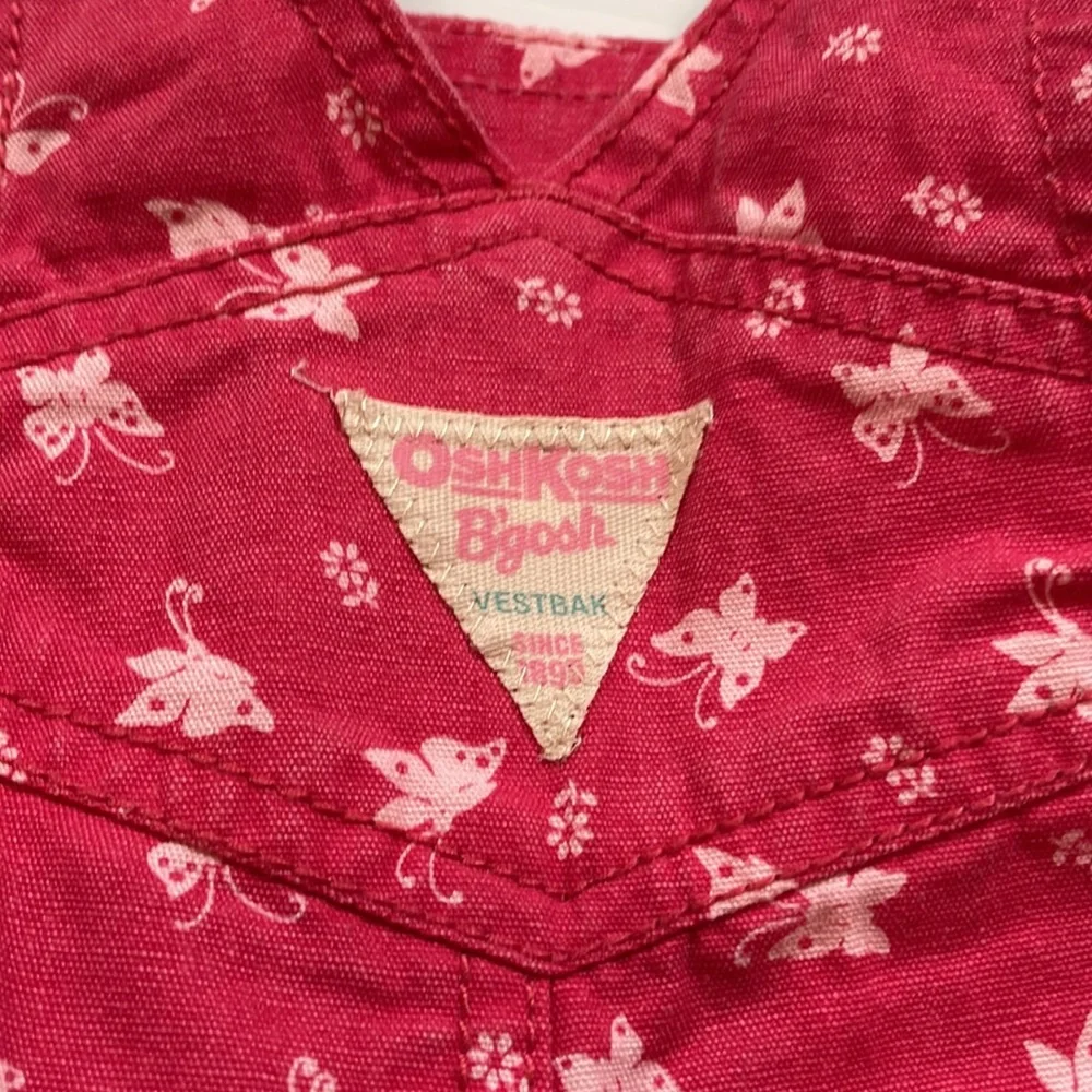 Oshkosh B’gosh pink bib overalls with butterflies, size 6 months